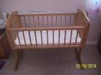 SWINGING CRIB in natural with matress can be locked in....